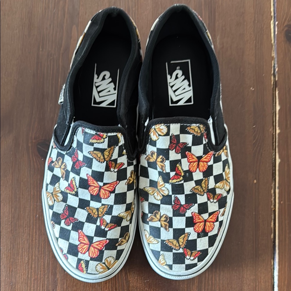 Vans Black and White Checkerboard Slip-On Sneakers